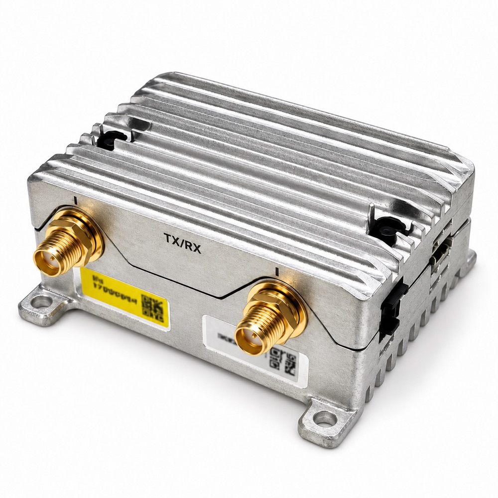 HCOM100 communication module, TX/RX antenna connectors on a finned alloy housing